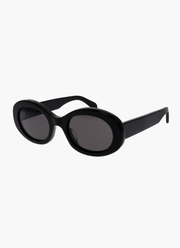 Women’s round sunglasses with wide plastic frame – retro style