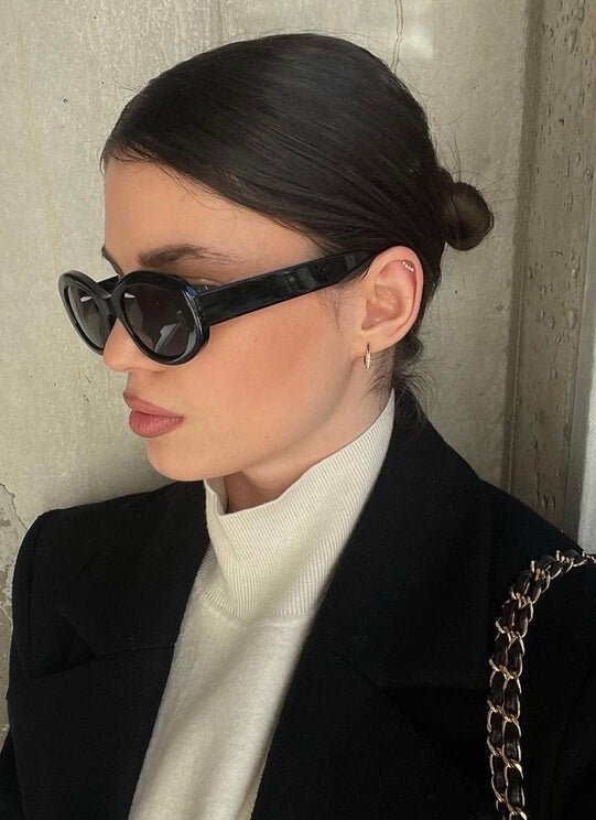 Women’s round sunglasses with wide plastic frame – retro style