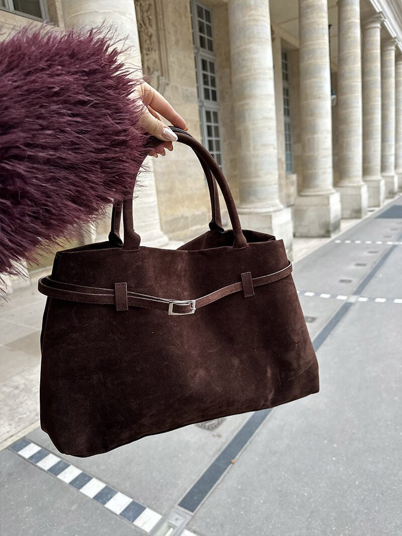 Women’s satchel bag in suede-look material with strap closure and short handle