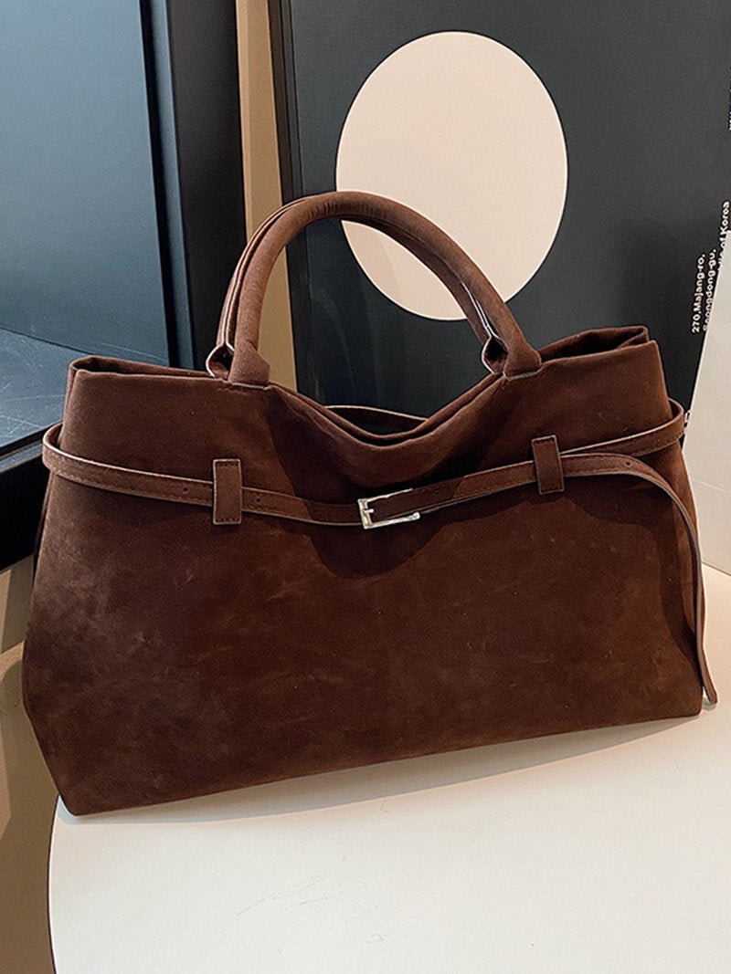 Women’s satchel bag in suede-look material with strap closure and short handle