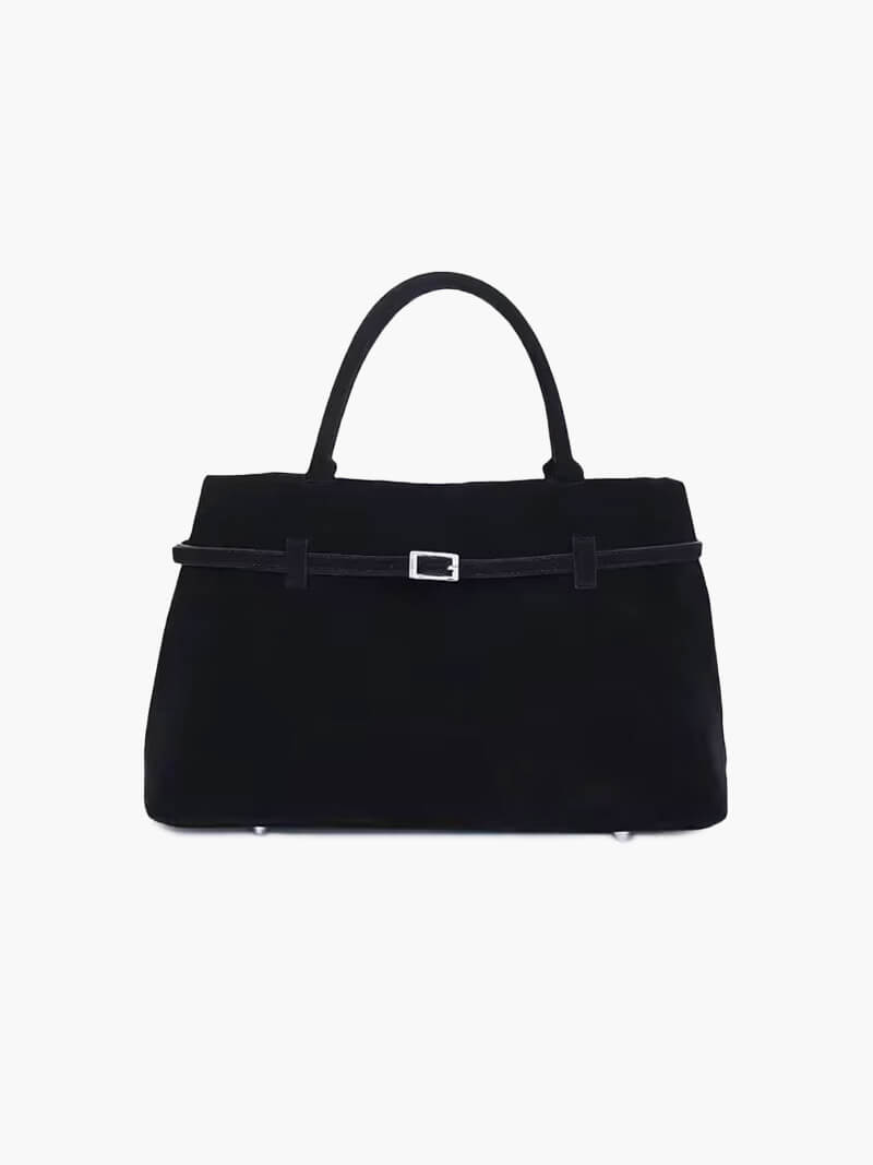 Women’s satchel bag in suede-look material with strap closure and short handle