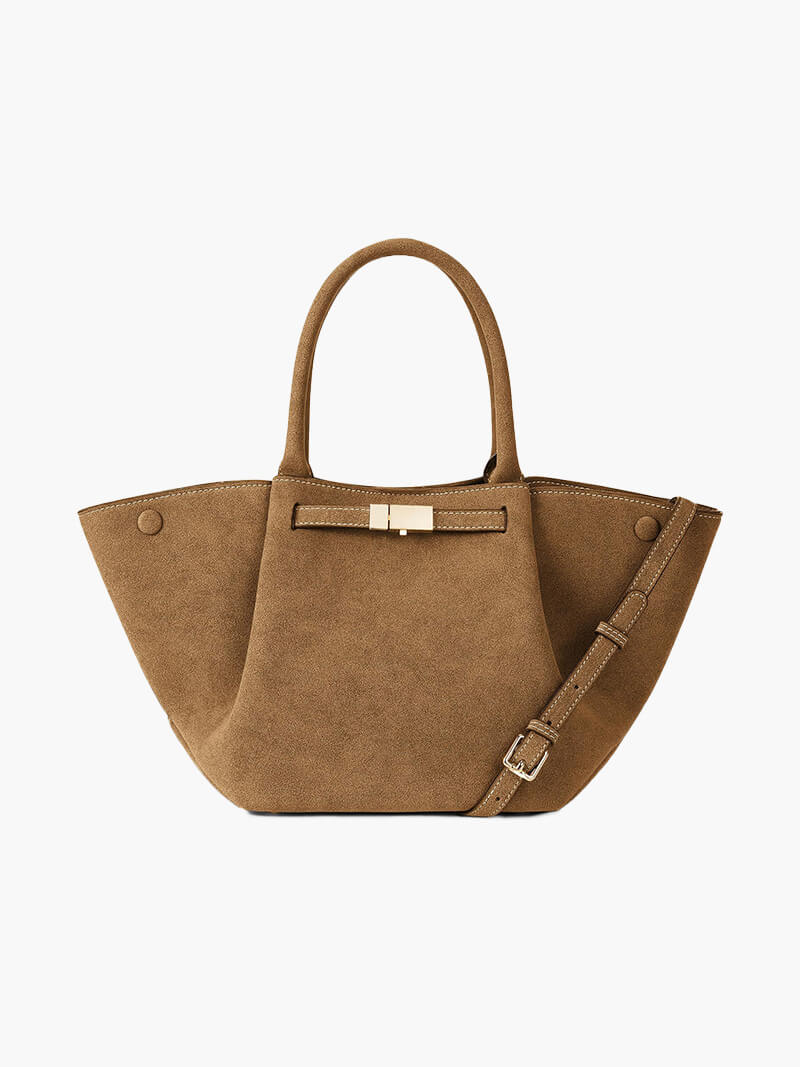 Women’s trapeze-shaped handbag in suede-look material with handles, strap closure, and shoulder strap
