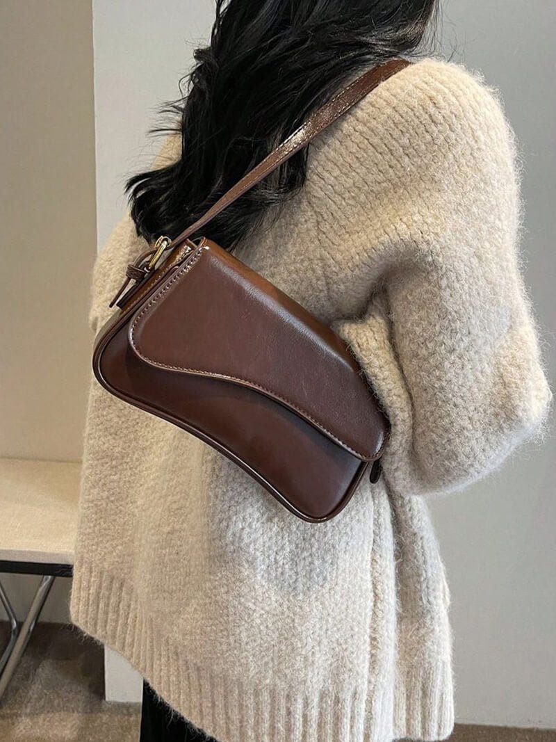 Women's shoulder bag – dark brown leather with wave design
