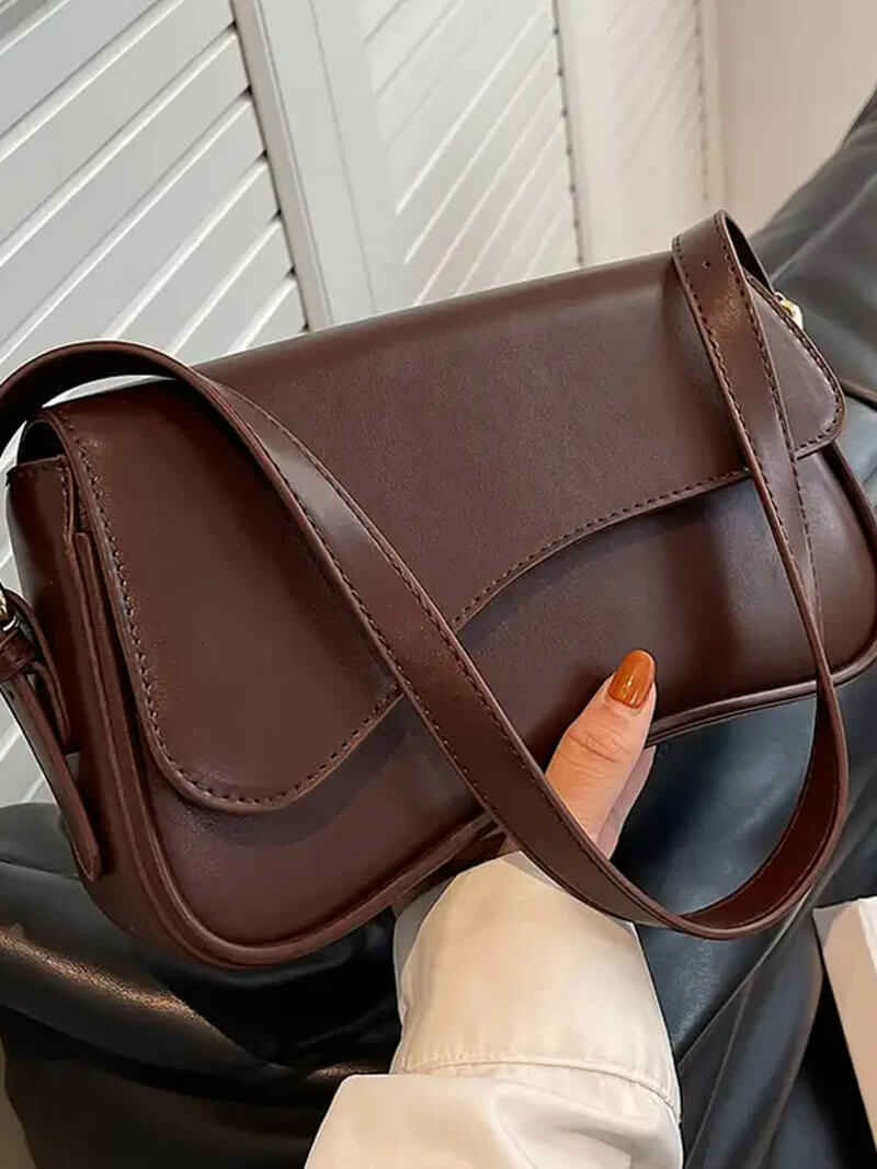Women's shoulder bag – dark brown leather with wave design