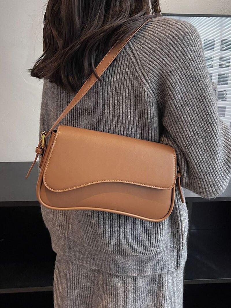Women's shoulder bag – dark brown leather with wave design