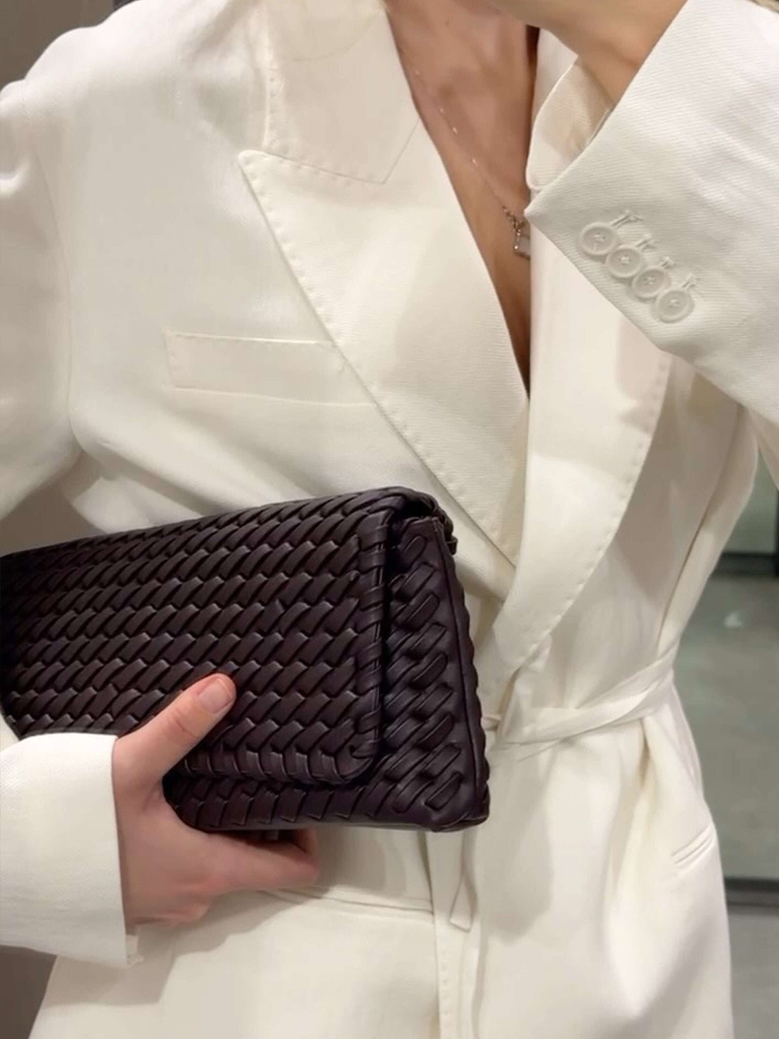 Women’s woven baguette bag in dark brown faux leather with shoulder strap
