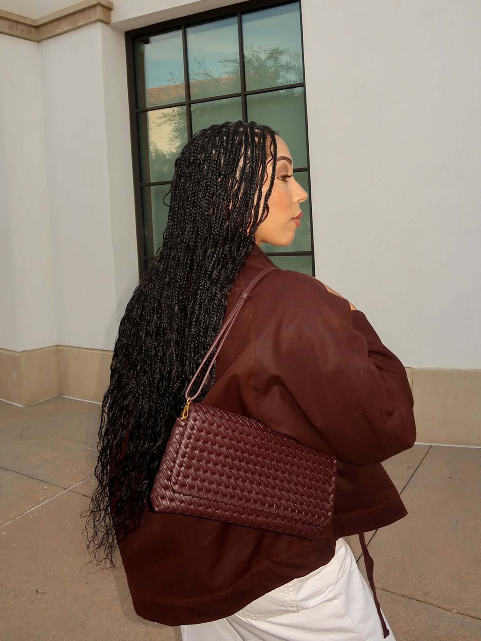 Women’s woven baguette bag in dark brown faux leather with shoulder strap
